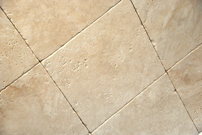 Ivory Travertine 12x12 Unfilled and Tumbled Tile - TILE & MOSAIC DEPOT